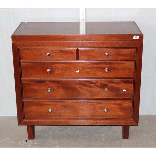 17 - A 1960s Mahogany chest of two short & three long drawers with silvered knobs, on stile supports, 38