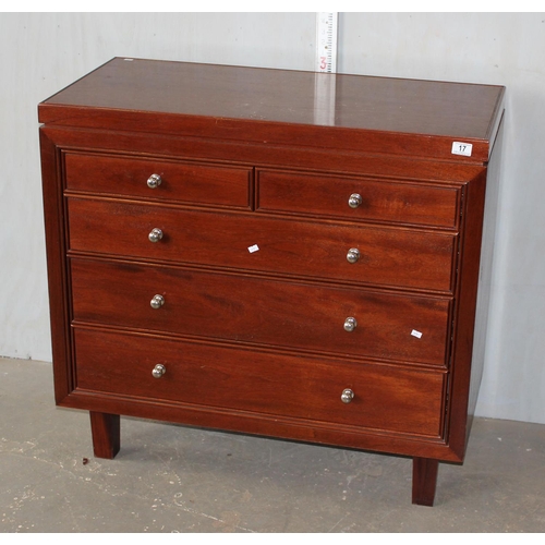 17 - A 1960s Mahogany chest of two short & three long drawers with silvered knobs, on stile supports, 38