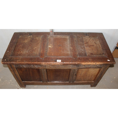 31 - Antique panelled coffer with carved details