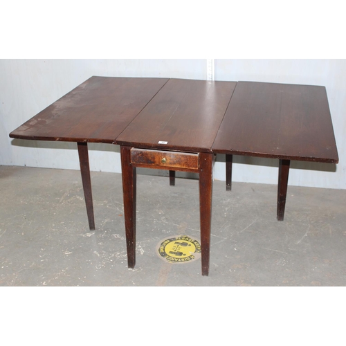 32 - Antique drop leaf dining table