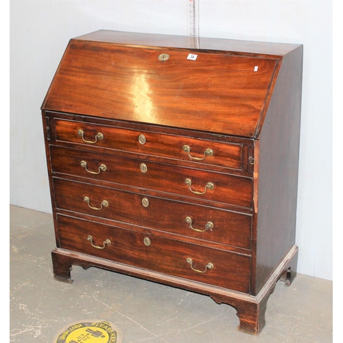 34 - Antique 4 drawer bureau on bracket feet with brass handles