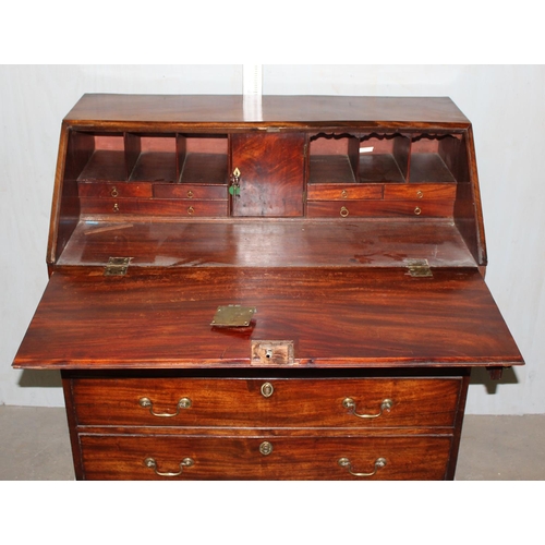 34 - Antique 4 drawer bureau on bracket feet with brass handles