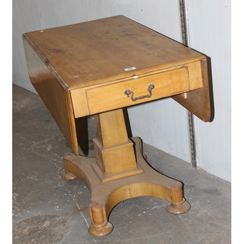 40 - An unusual antique drop leaf Pembroke table with drawer and pedestal base