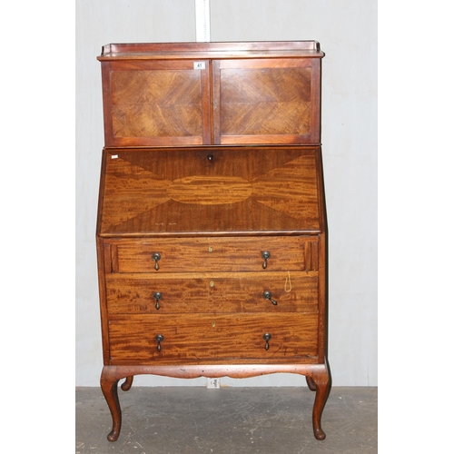 41 - An unusual early 20th century 3 drawer bureau with cupboard top