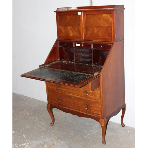 41 - An unusual early 20th century 3 drawer bureau with cupboard top