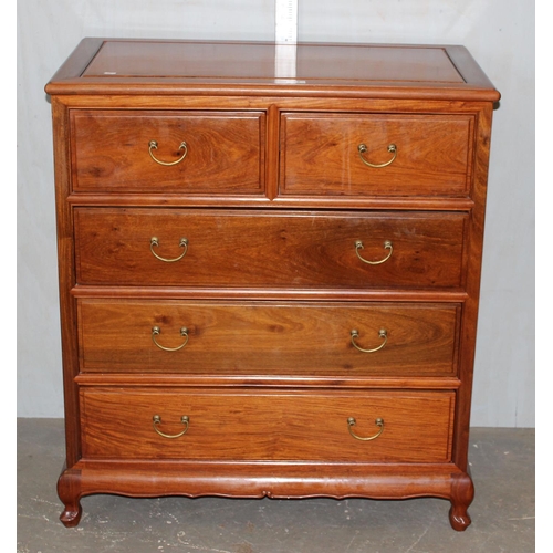 52 - A 20th century Chinese carved wooden 2 over 3 chest of drawers