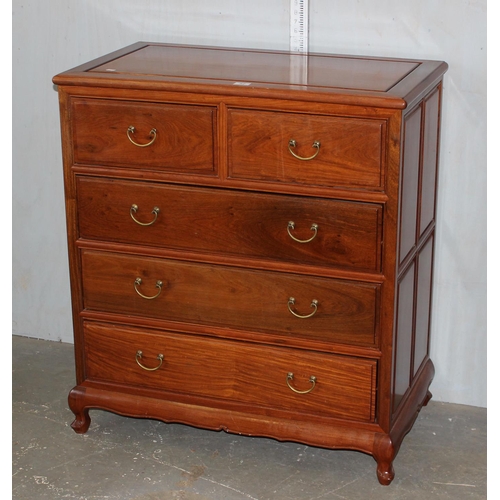 52 - A 20th century Chinese carved wooden 2 over 3 chest of drawers