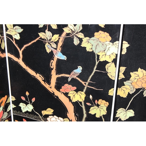 54 - A 20th century Chinese six fold dressing screen, painted or lacquer finish with textured scene of bi... 