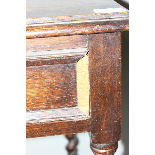 71 - A Jacobean style console table with single drawer standing on Barleytwist legs