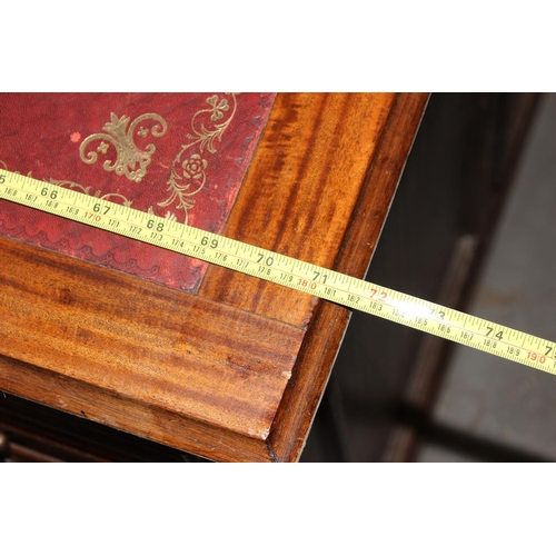 80 - A large Mahogany partners desk with Ox-Blood red leather gilt tooled top