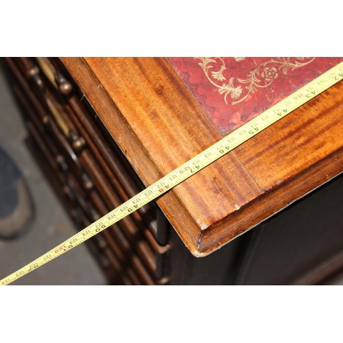 80 - A large Mahogany partners desk with Ox-Blood red leather gilt tooled top