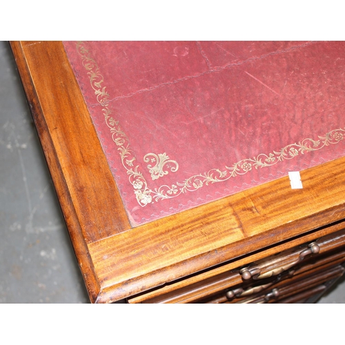 80 - A large Mahogany partners desk with Ox-Blood red leather gilt tooled top