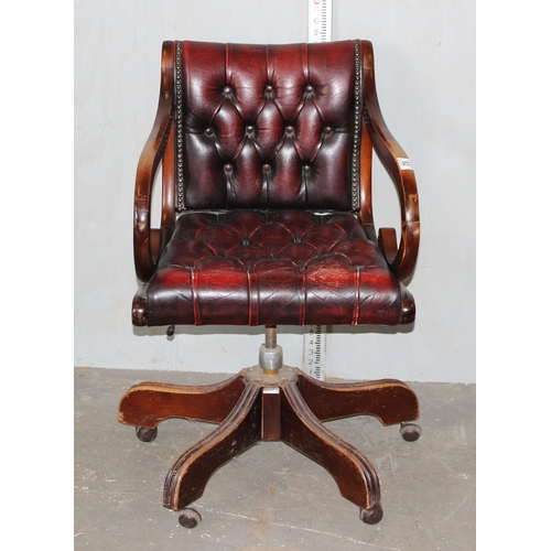 82 - A vintage Ox-Blood red Chesterfield leather desk or captain's swivel chair to match previous desk