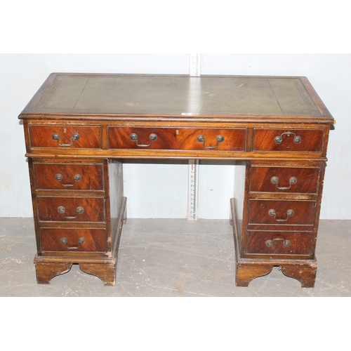 94 - 20th century leather topped desk