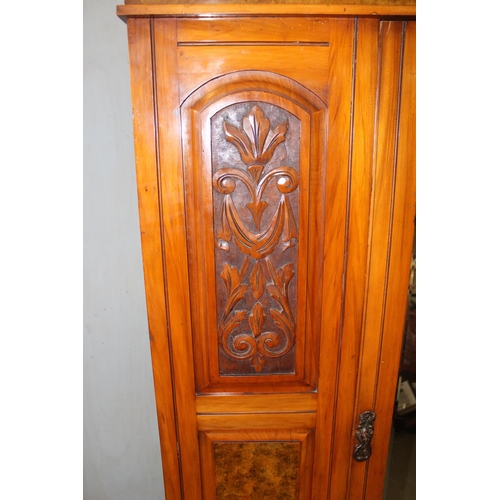 98 - Early 20th century wardrobe with mirror door and carved details