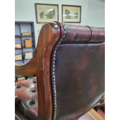 82 - A vintage Ox-Blood red Chesterfield leather desk or captain's swivel chair to match previous desk