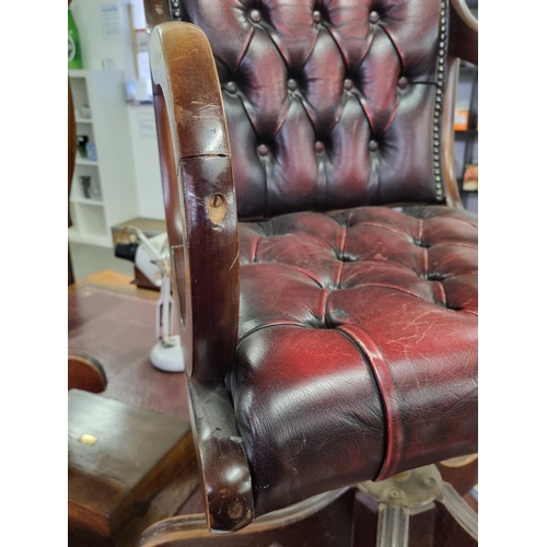 82 - A vintage Ox-Blood red Chesterfield leather desk or captain's swivel chair to match previous desk