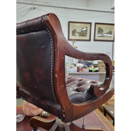 82 - A vintage Ox-Blood red Chesterfield leather desk or captain's swivel chair to match previous desk