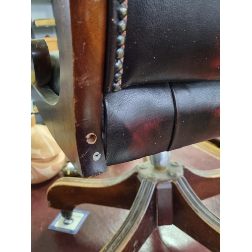 82 - A vintage Ox-Blood red Chesterfield leather desk or captain's swivel chair to match previous desk