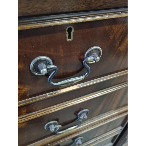 83 - A large pair of Mahogany effect office cabinets with Ox-Blood red leather gilt tooled top