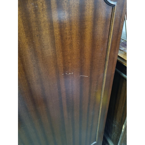 83 - A large pair of Mahogany effect office cabinets with Ox-Blood red leather gilt tooled top