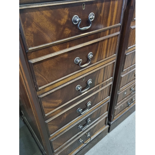 83 - A large pair of Mahogany effect office cabinets with Ox-Blood red leather gilt tooled top