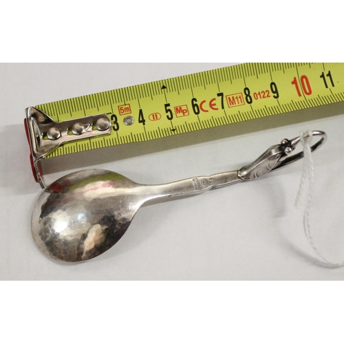 1107 - A Georg Jensen Danish silver Skonvirke preserve spoon, model 21, designed 1912, Ornamental Blossom d... 