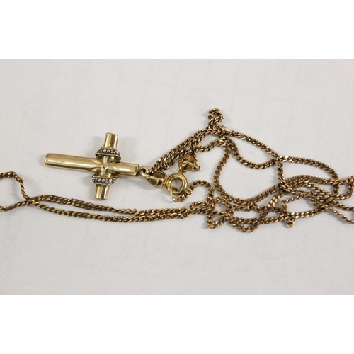 1200 - 9ct gold crucifix pendant on 9ct chain, the crucifix set with small diamonds, approx 20