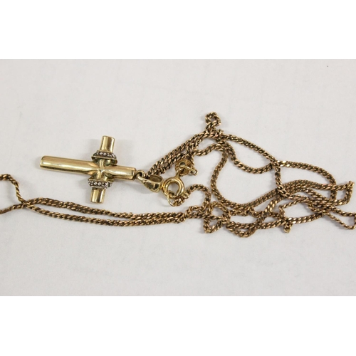 1200 - 9ct gold crucifix pendant on 9ct chain, the crucifix set with small diamonds, approx 20