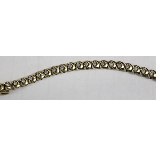 1201 - 9ct gold & diamond tennis bracelet, small diamonds set within an unusual crescent moon shaped settin... 