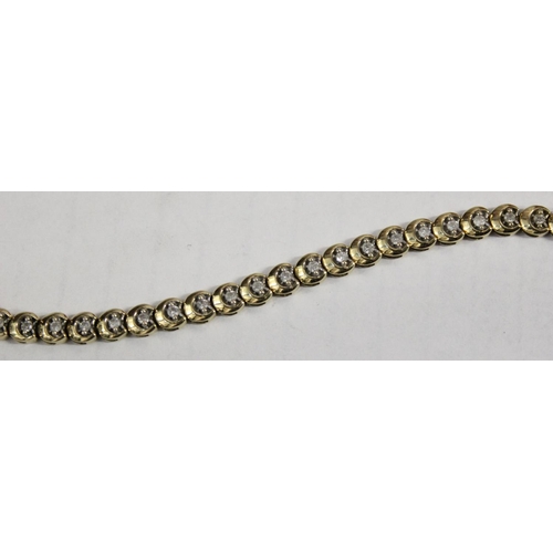 1201 - 9ct gold & diamond tennis bracelet, small diamonds set within an unusual crescent moon shaped settin... 