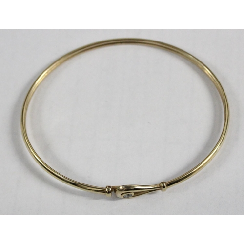 1202 - 9ct gold and diamond bracelet or bangle, approx 3.91g gross, magnetic metal core