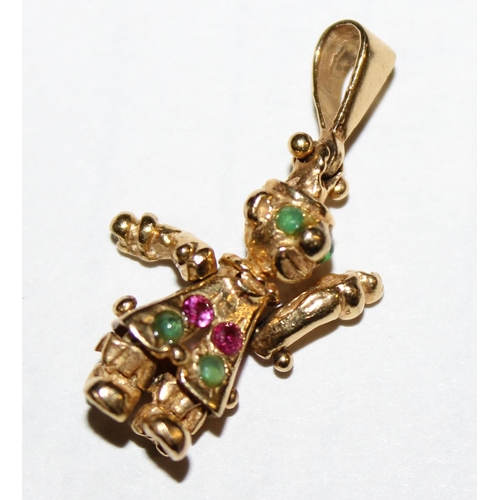 1205 - 9ct gold charm formed as a clown, set with green & pink stones, articulated arms and legs, approx 3.... 