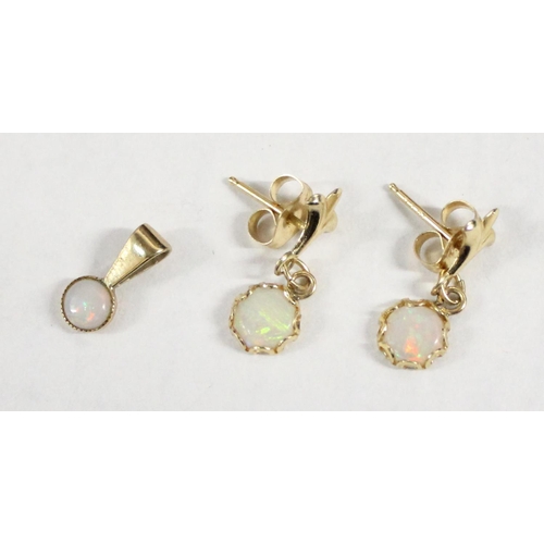 1211 - A pair of yellow metal and opal earrings and pendant, the earrings marked 14kt, the pendant and butt... 