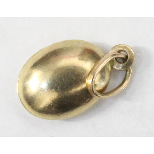 1214 - 9ct gold charm formed as a coffee bean, approx 0.38g gross weight