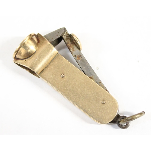 1218 - 9ct gold and steel cigar cutter, marked for Chester 1912 by E. Baker & Sons, approx 12.11g gross wei... 