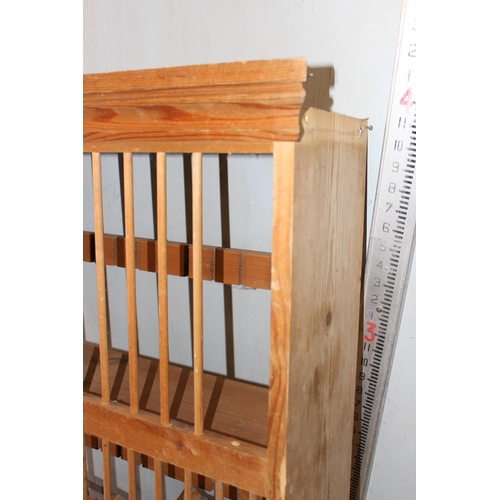 113 - A pine wall mounted plate rack and 2 wine racks