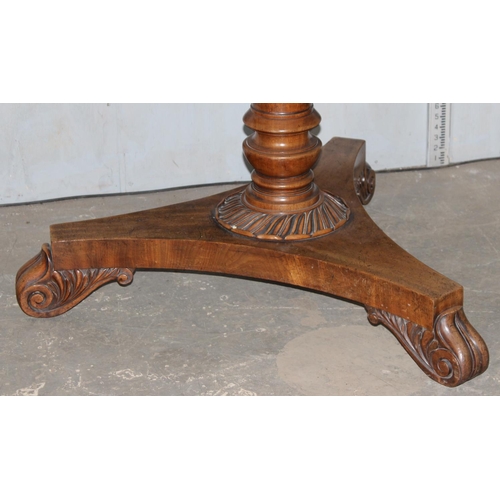 18 - Mahogany round tilt top breakfast table on carved pedestal