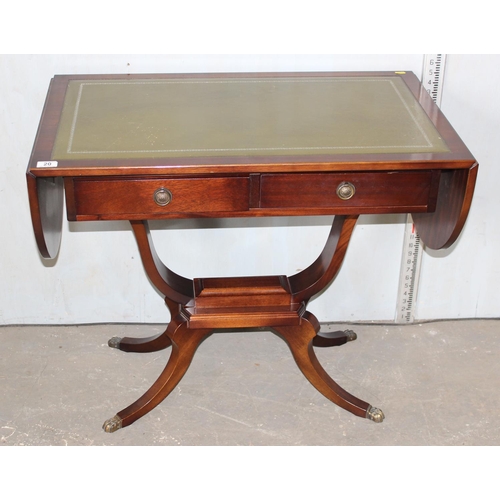 20 - An antique style leather topped dropleaf sofa table