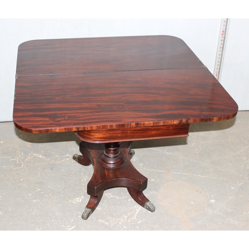 22 - A 19th century mahogany folding tea table