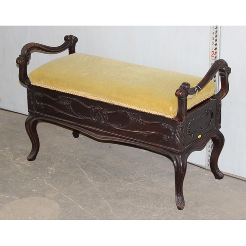 26 - A Victorian carved mahogany duet piano stool in the Art Nouveau taste and gold coloured upholstery