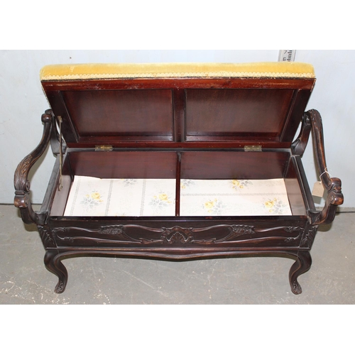 26 - A Victorian carved mahogany duet piano stool in the Art Nouveau taste and gold coloured upholstery