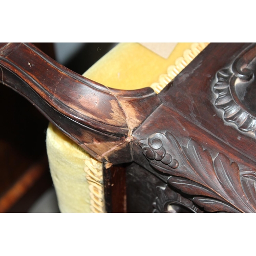 26 - A Victorian carved mahogany duet piano stool in the Art Nouveau taste and gold coloured upholstery