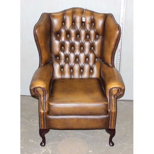 30 - Chesterfield button back armchair in Tan colour on cabriole legs