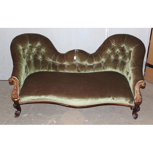 40 - Victorian Chesterfield button back sofa or conversation seat on casters with mahogany carved detaile... 