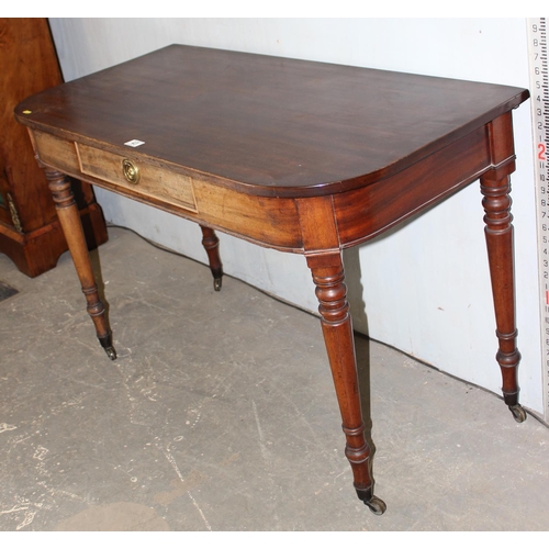 43 - Victorian mahogany D shaped hall table with drawer on brass castors