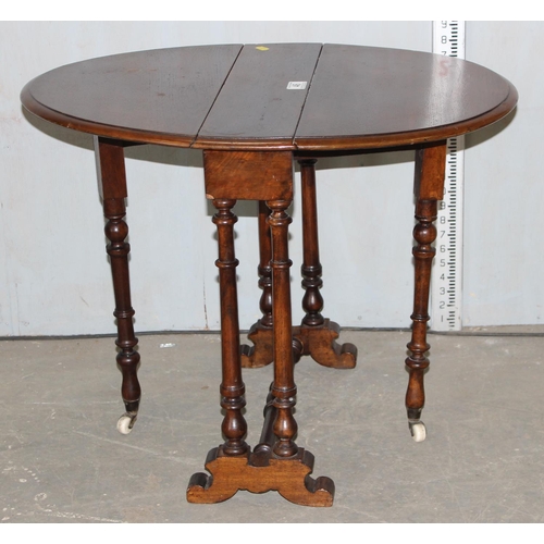 46 - Small antique Sutherland table with brass and ceramic castors