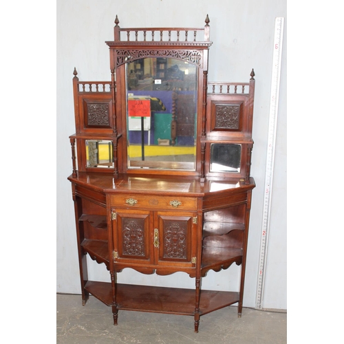 51 - Edwardian mirrored chiffonier with heavily carved panels and doors and a single drawer. Fret work de... 