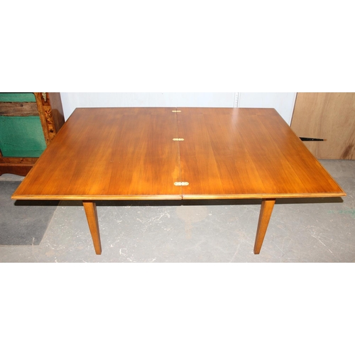 54 - Reproduction extending dining table on tapering legs with four chairs to match