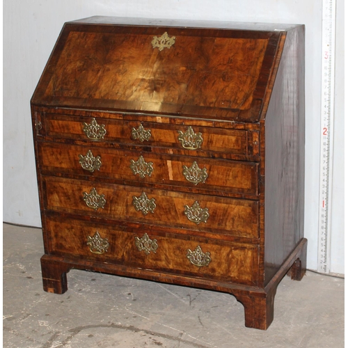 56 - Early 19th century Walnut fall front bureau on bracket feet with brass furniture